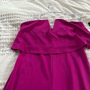 NWT bebe strapless jumpsuit
Size 10
Magenta
